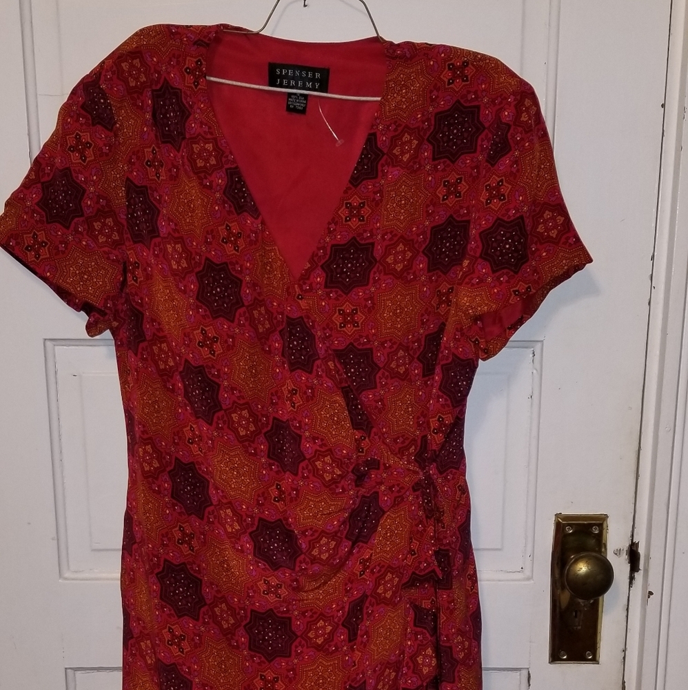 Crossover wrap dress. Knee or just below length